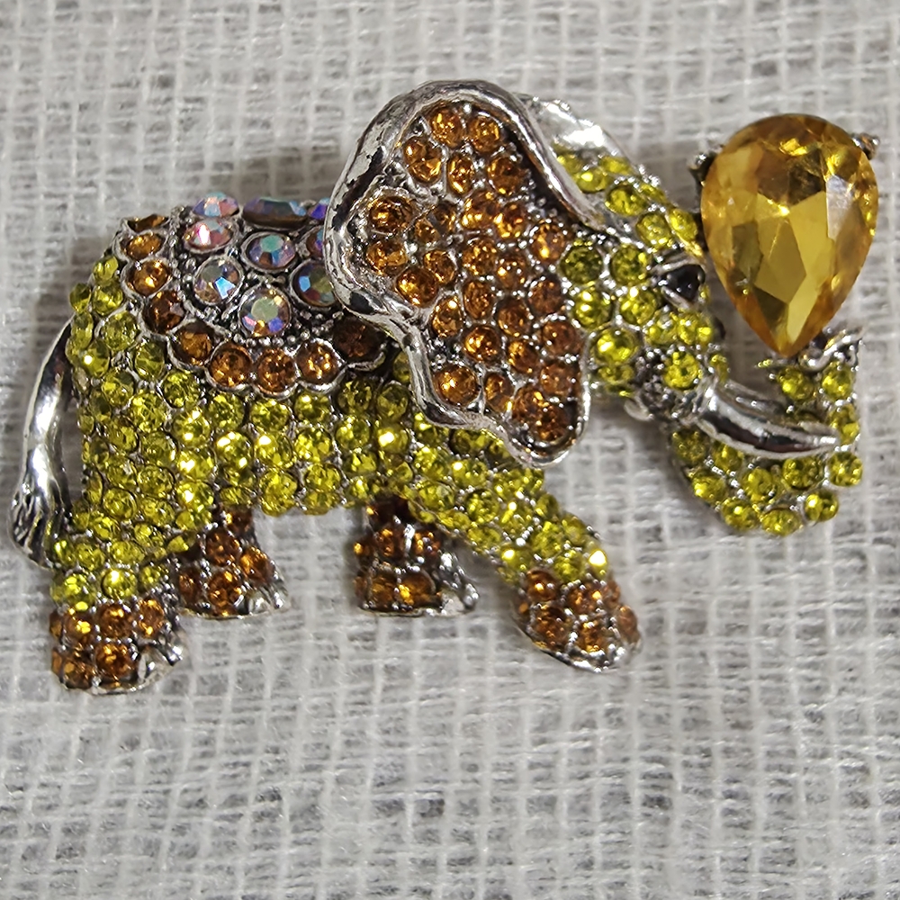 Sparkling Elephant Brooch with Yellow and Brown Crystals